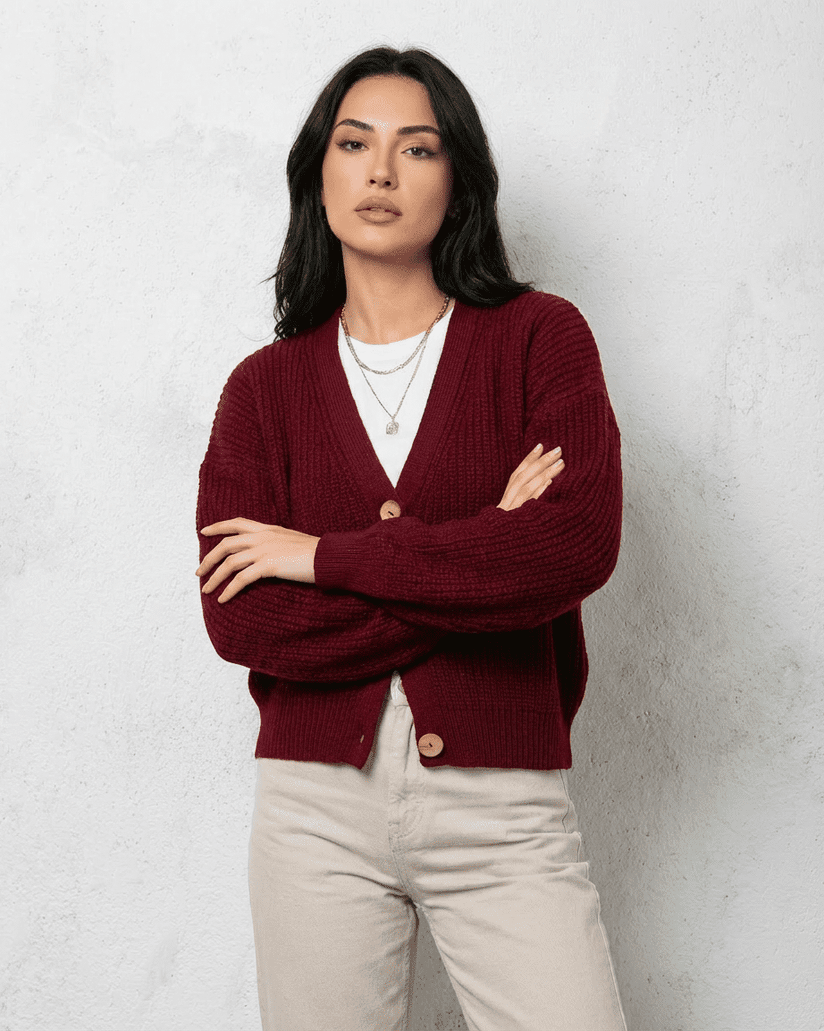 Vesper Cardigan by Slimona, luxurious burgundy knitwear with a classic V-neck design.