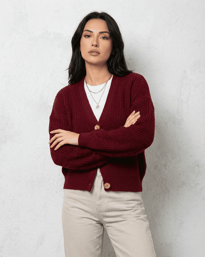 Vesper Cardigan by Slimona, luxurious burgundy knitwear with a classic V-neck design.