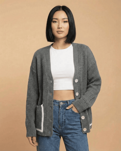 Linden Cardigan by Slimona, relaxed V-neck, color block knit, loose fit silhouette, and button-front closure.