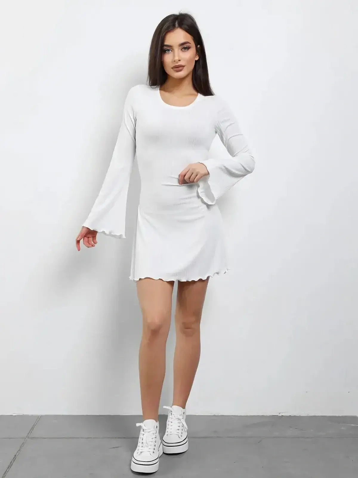Luxe Lace-Up white mini dress with long flared sleeves, perfect for summer, weddings, or casual outings.