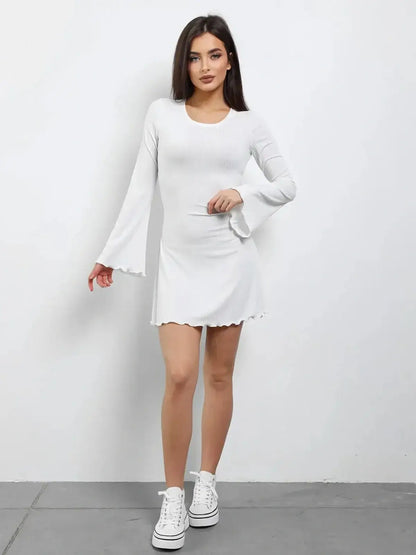 Luxe Lace-Up white mini dress with long flared sleeves, perfect for summer, weddings, or casual outings.