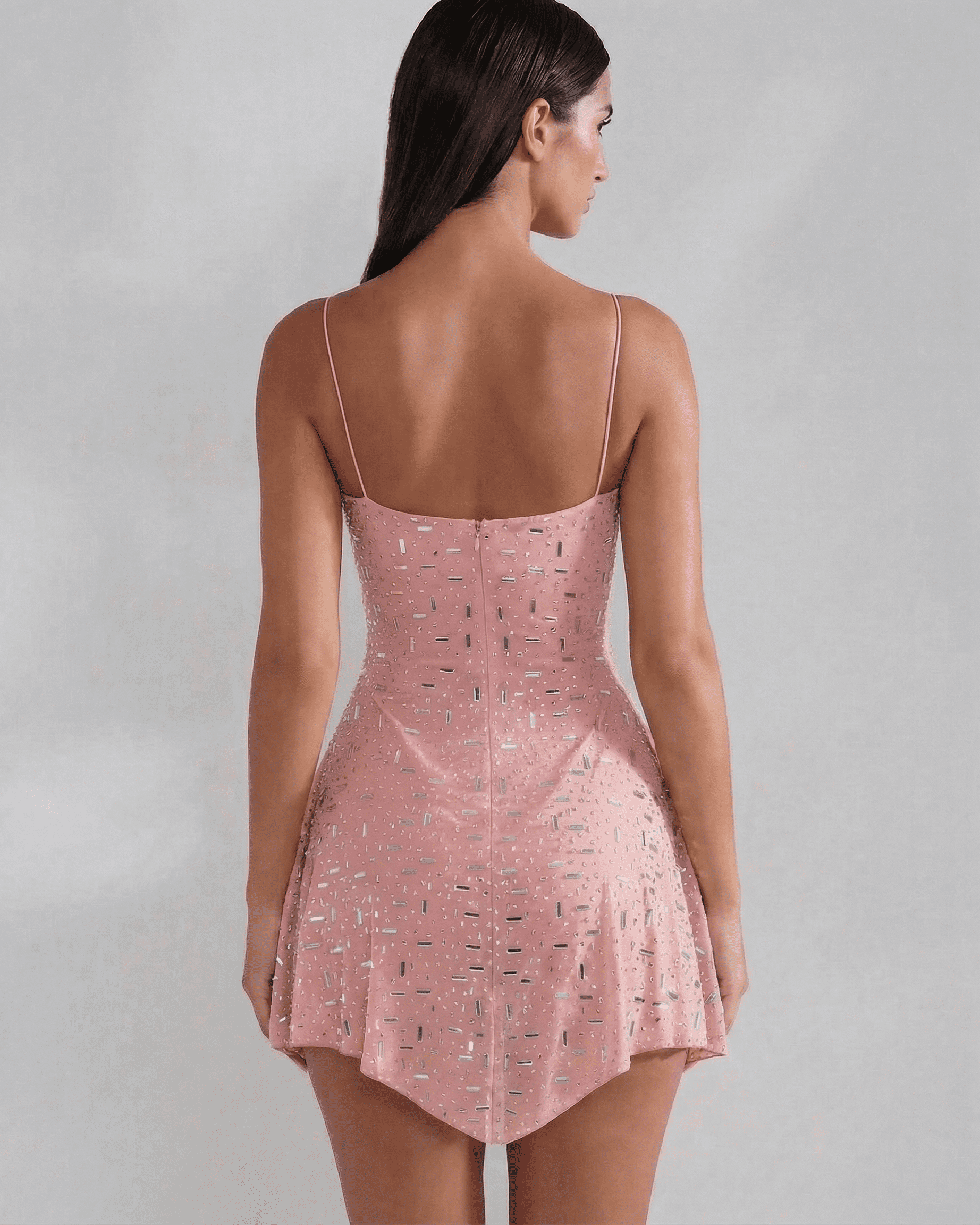 Back view of Slimona Lyra Mini Dress in blush with subtle sparkle and structured square neckline.