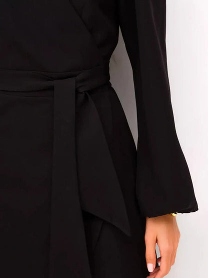 Close-up of the elegant waist tie detail on the Midnight Kimono black midi dress, showcasing its sophisticated design.