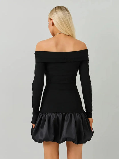 Back view of Midnight Petal black mini dress with off-the-shoulder neckline and balloon skirt, perfect for evening events.