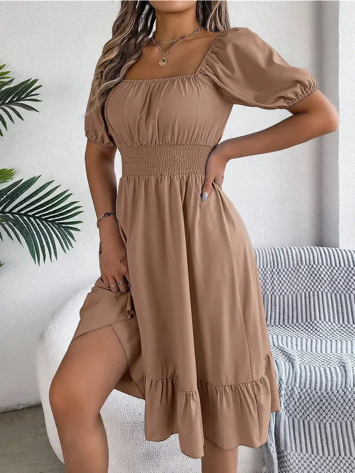 Mocha Breeze mini dress with puff sleeves and a shirred waist, perfect for summer events and casual outings.