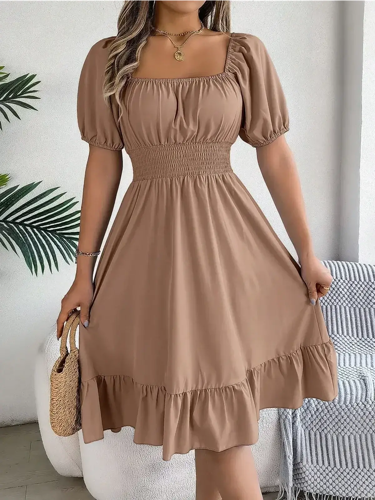Mocha Breeze mini dress featuring a square neckline, puff sleeves, and a ruffled hem, perfect for summer events.