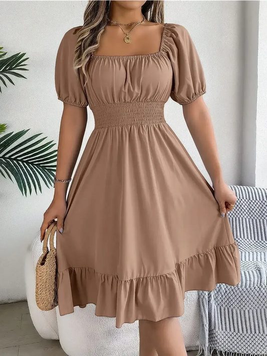 Mocha Breeze mini dress featuring a square neckline, puff sleeves, and a ruffled hem, perfect for summer events.