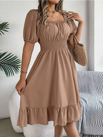 Mocha Breeze mini dress featuring puff sleeves, a square neckline, and ruffled hem, perfect for summer and casual gatherings.
