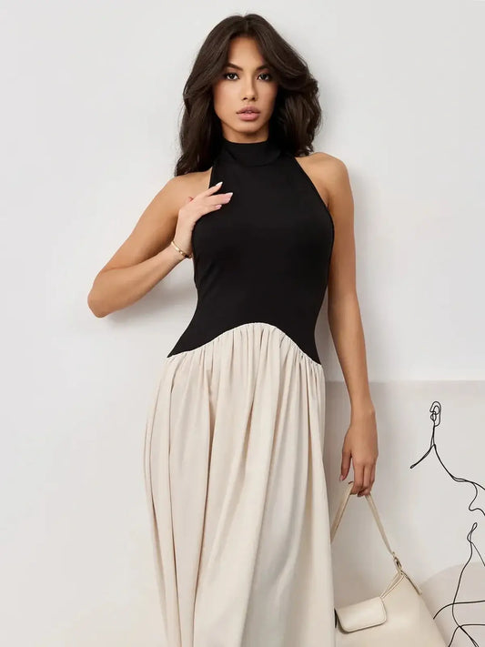 Muse Hourglass midi dress featuring a black halter bodice and flowing beige skirt, perfect for weddings or formal events.
