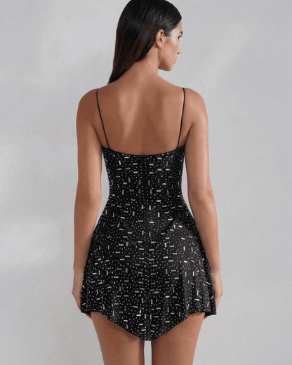 Noir Mini Dress by Slimona, showcasing a sleek black embellished design with a structured back and delicate spaghetti straps.