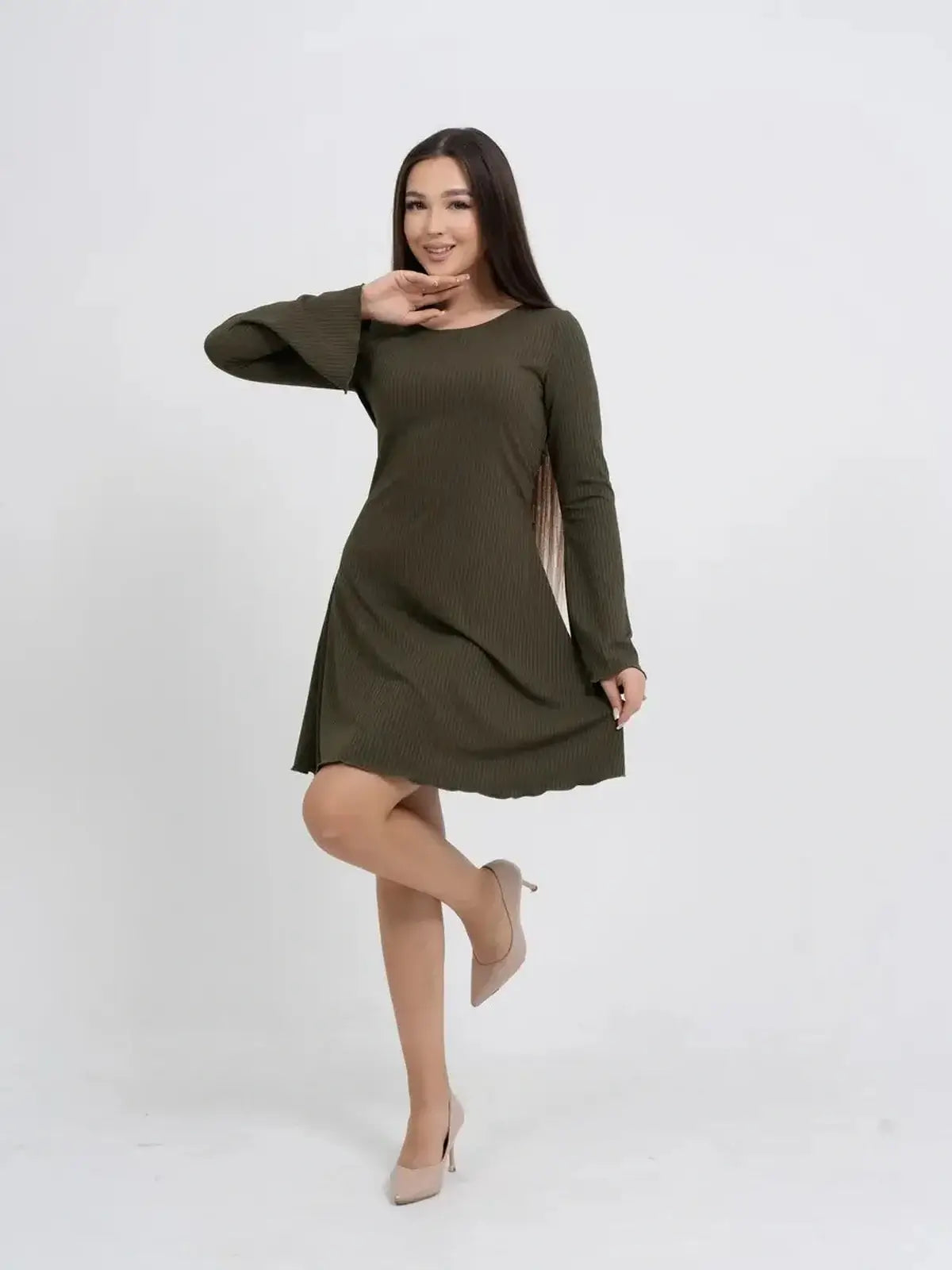 Olive Muse long sleeve mini dress in ribbed fabric, perfect for daytime or evening wear, with flowing bell sleeves.
