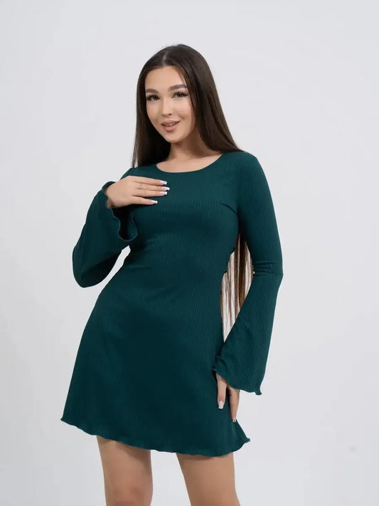 Model wearing a teal long sleeve mini dress with bell sleeves, perfect for summer and party occasions.