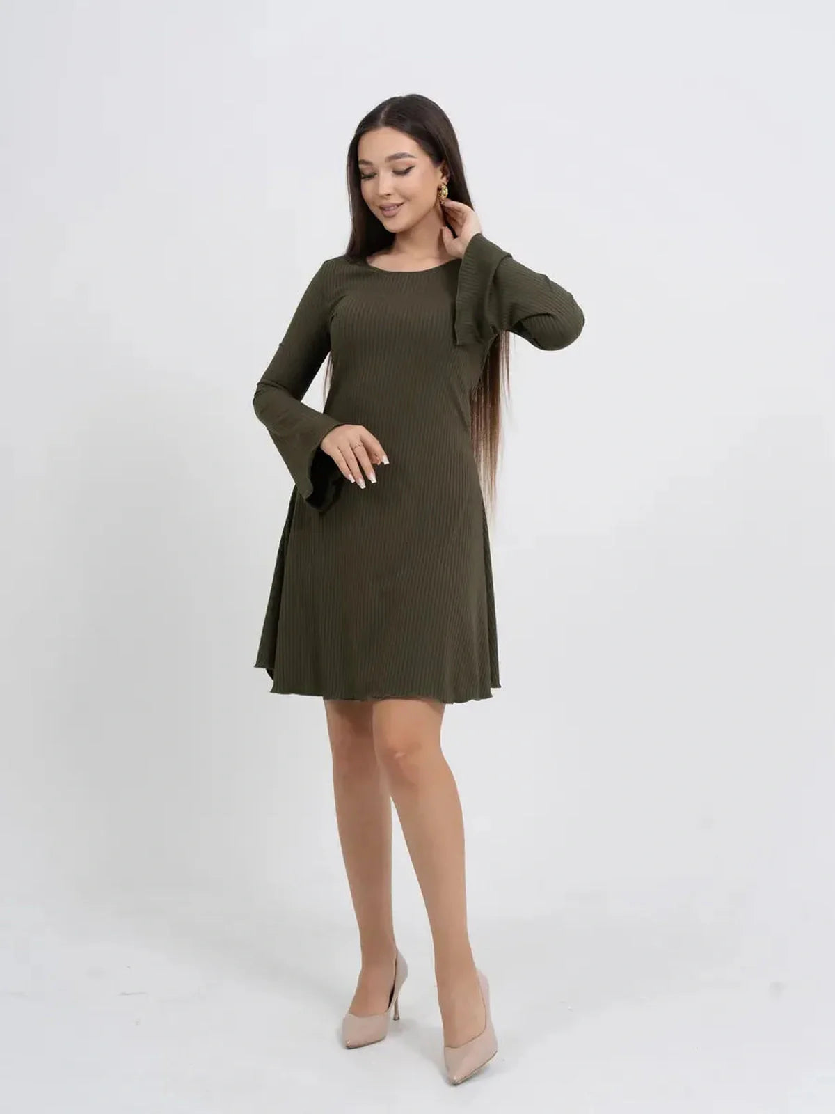 Olive Muse long sleeve mini dress in ribbed stretch-knit fabric with bell sleeves, perfect for casual or formal occasions.