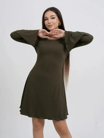 Olive Muse long sleeve mini dress in ribbed stretch-knit fabric with bell sleeves and flattering silhouette.