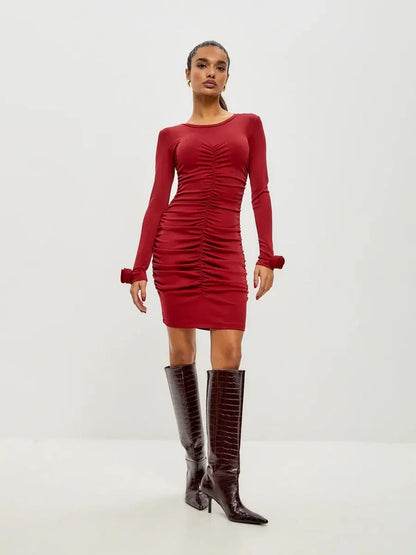 Sculpted Bloom red long sleeve dress with ruched details, perfect for party events or cocktail occasions.