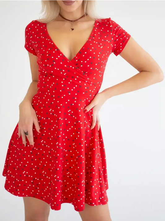 Red polka dot mini dress with V-neckline, perfect for summer, weddings, or parties.