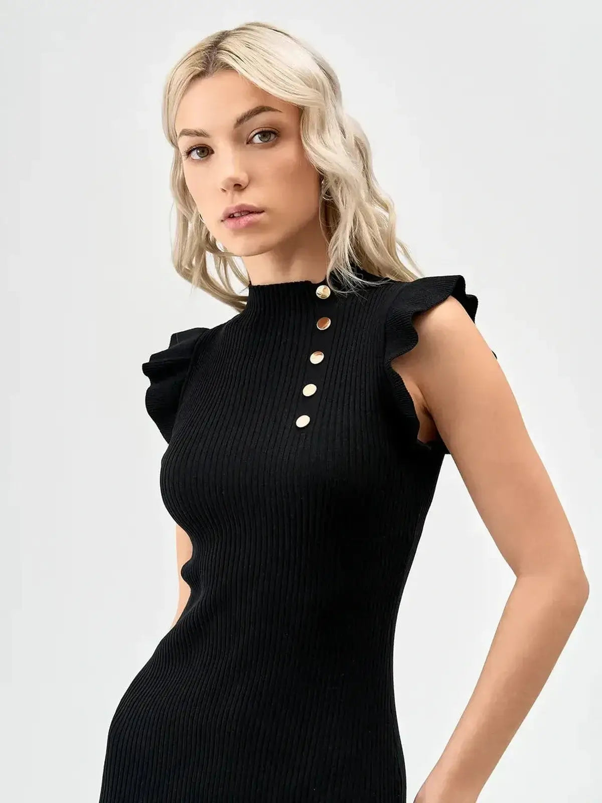 Black ribbed mini dress with ruffled sleeves and gold button detailing, perfect for casual or formal occasions.