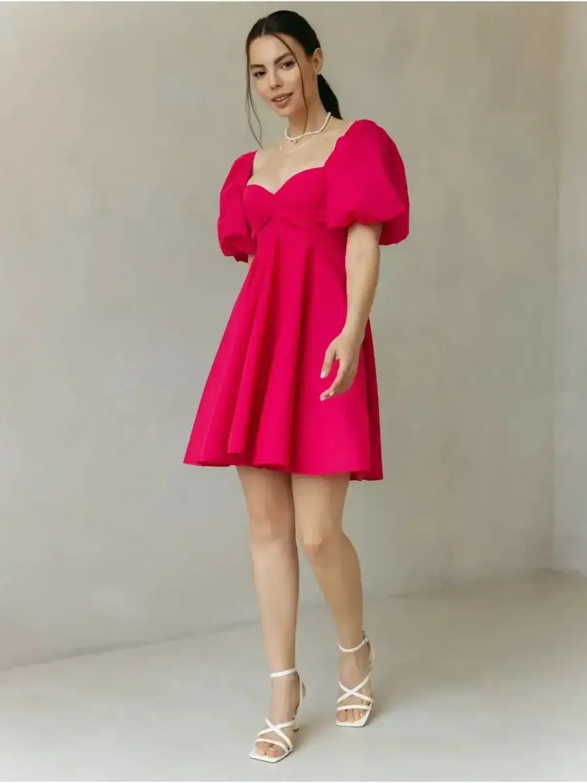 Rose Fizz Mini Dress in vibrant pink with puffy sleeves, perfect for summer parties, weddings, and casual outings.