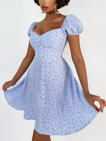 Light blue rose petal mini dress featuring puff sleeves and a flattering fit-and-flare silhouette, perfect for summer outings.