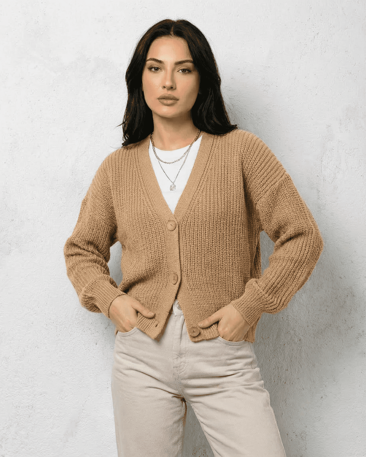 Saffron Cardigan by Slimona – Elegant beige knitwear with relaxed V-neck style and long sleeves.