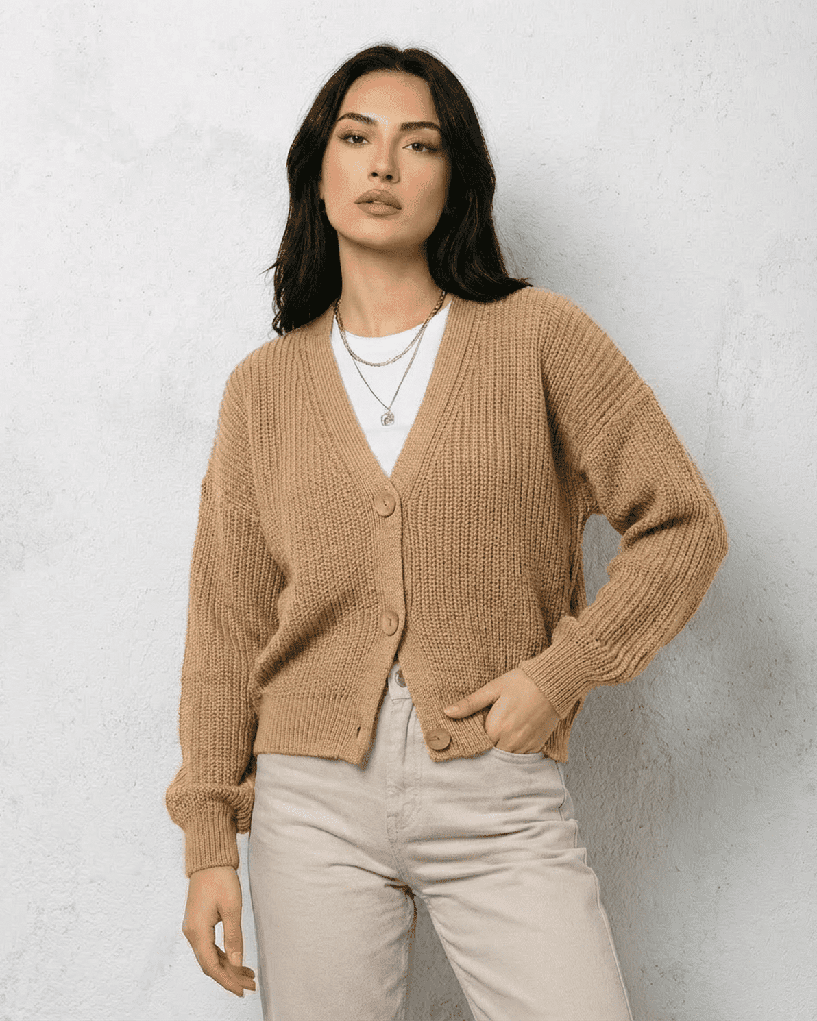Saffron Cardigan by Slimona, elegant beige knitwear with relaxed V-neck and long sleeves for cozy comfort.