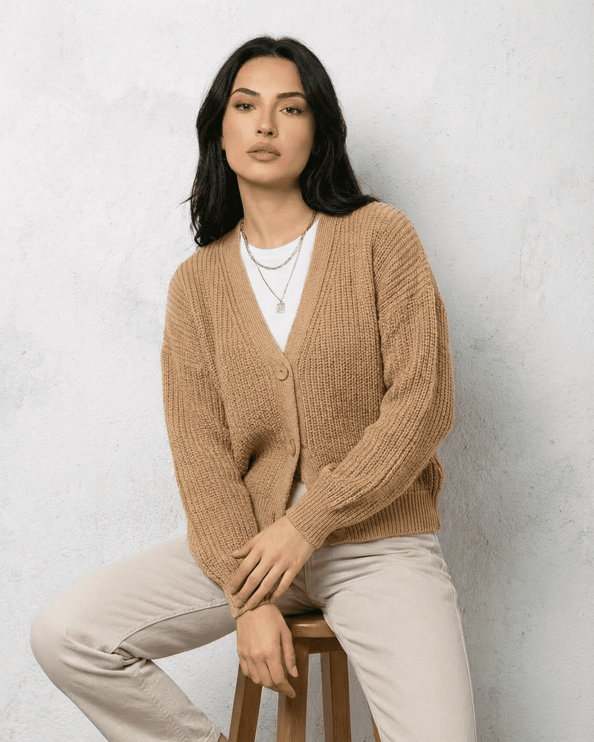 Saffron Cardigan by Slimona, elegant beige knitwear with relaxed V-neck and long sleeves.