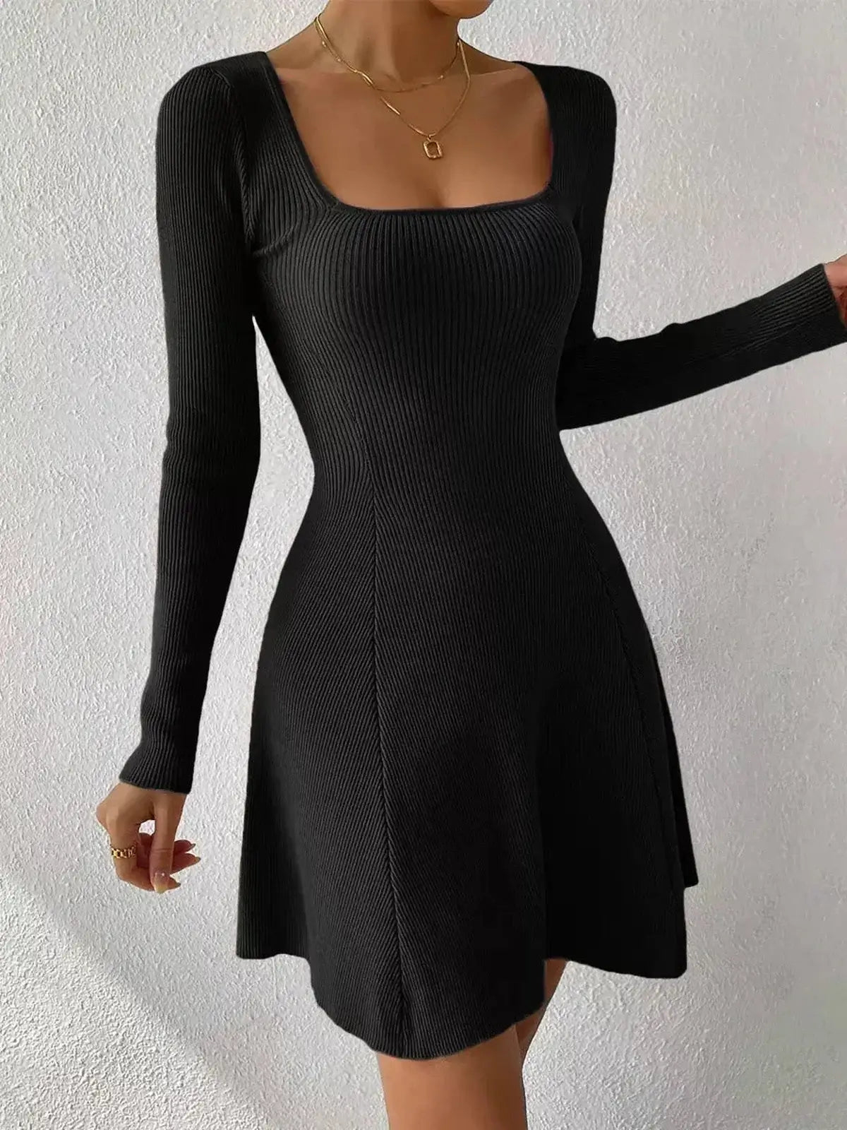 Sculpt Knit Dress in black with a square neckline and flared hem, perfect for summer, weddings, and cocktail parties.