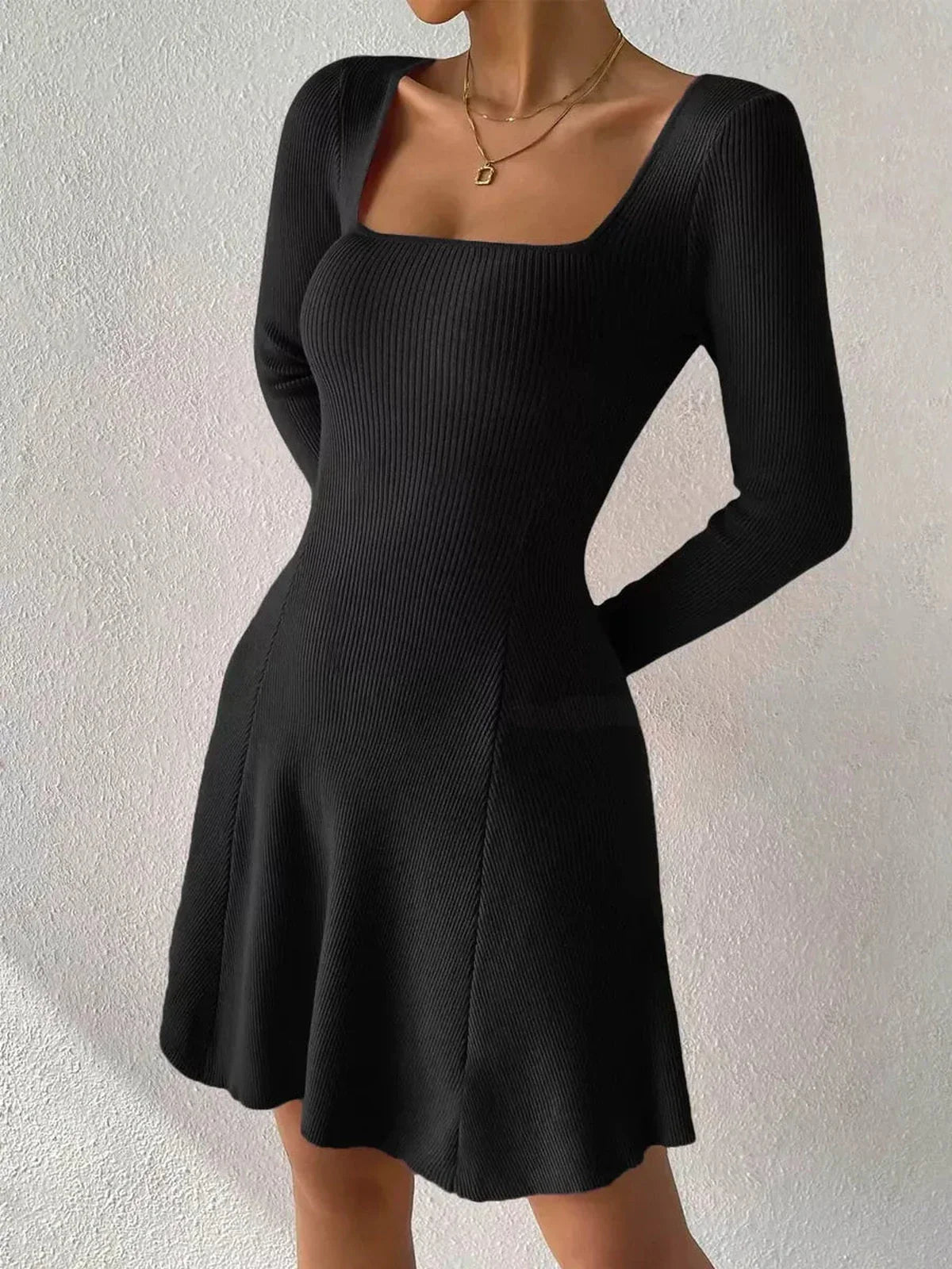 Black Sculpt Knit Dress with ribbed texture and square neckline, perfect for wedding guest, mother of the bride, or cocktail occasions.