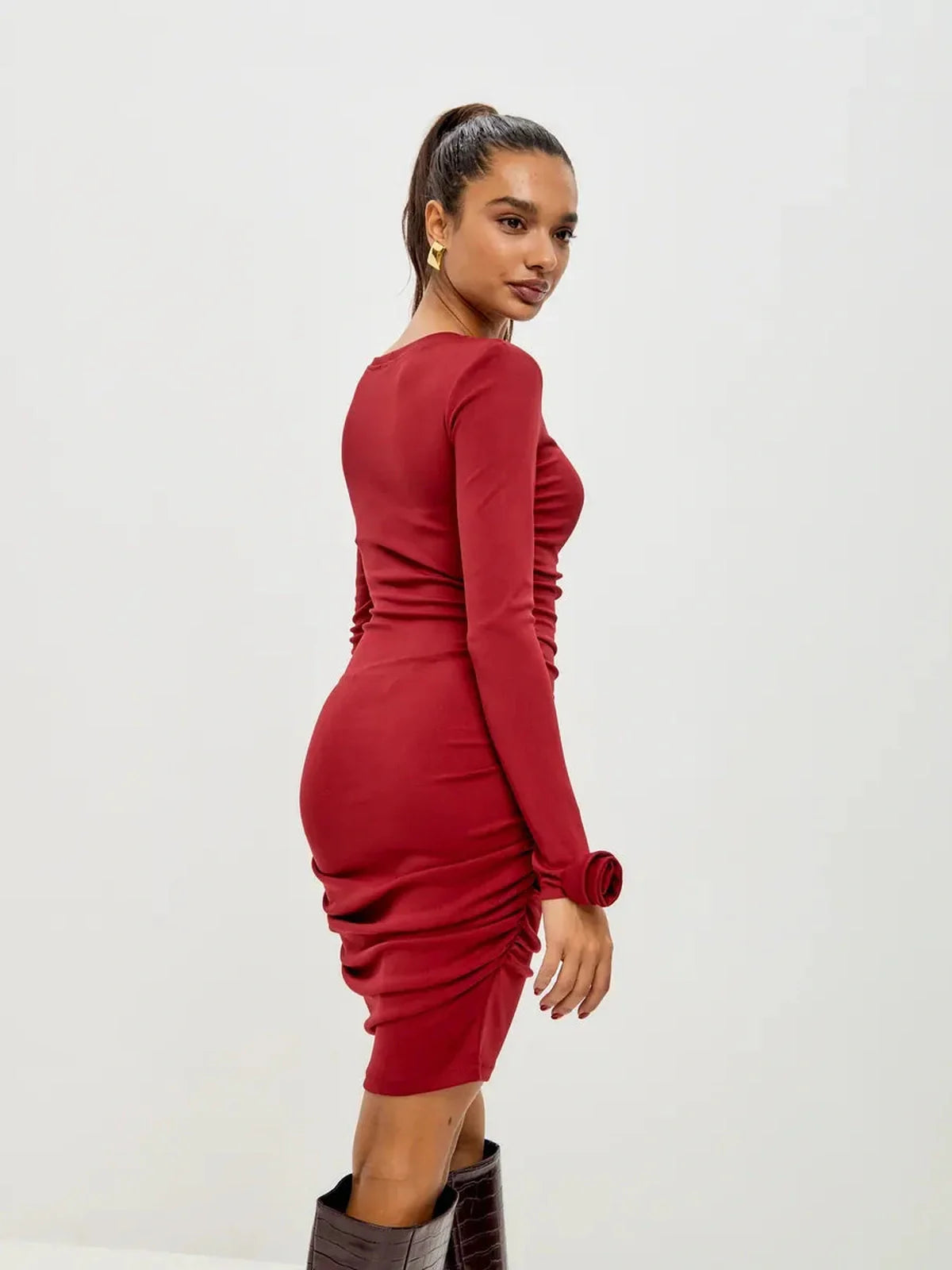 Sculpted Bloom red midi dress featuring ruched details and long sleeves, perfect for party or formal occasions.