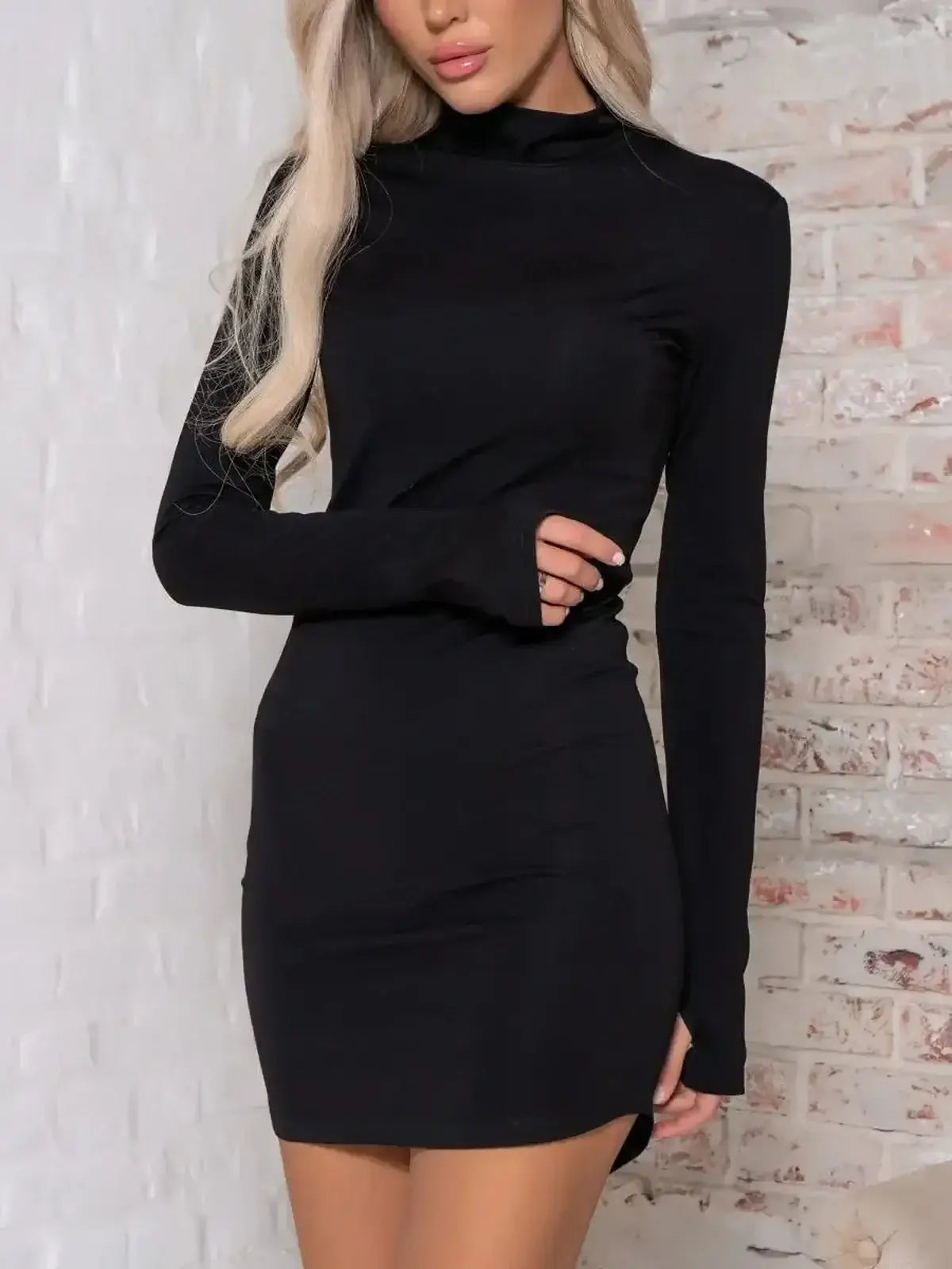 Sculpted Noir black mini dress with long sleeves and high neckline, perfect for weddings or evening wear.