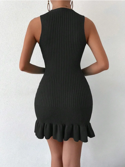 Black ribbed mini dress with flared hem, perfect for summer and special occasions.