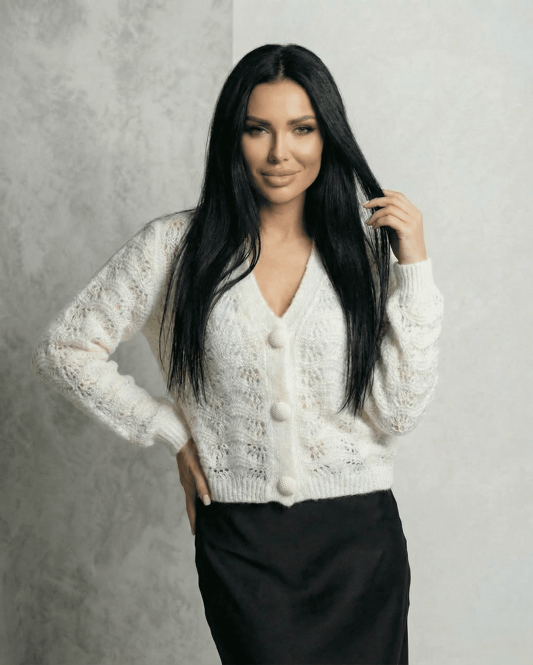 Serena Cardigan by Slimona, a delicate lace knit V-neck button front cardigan in white.