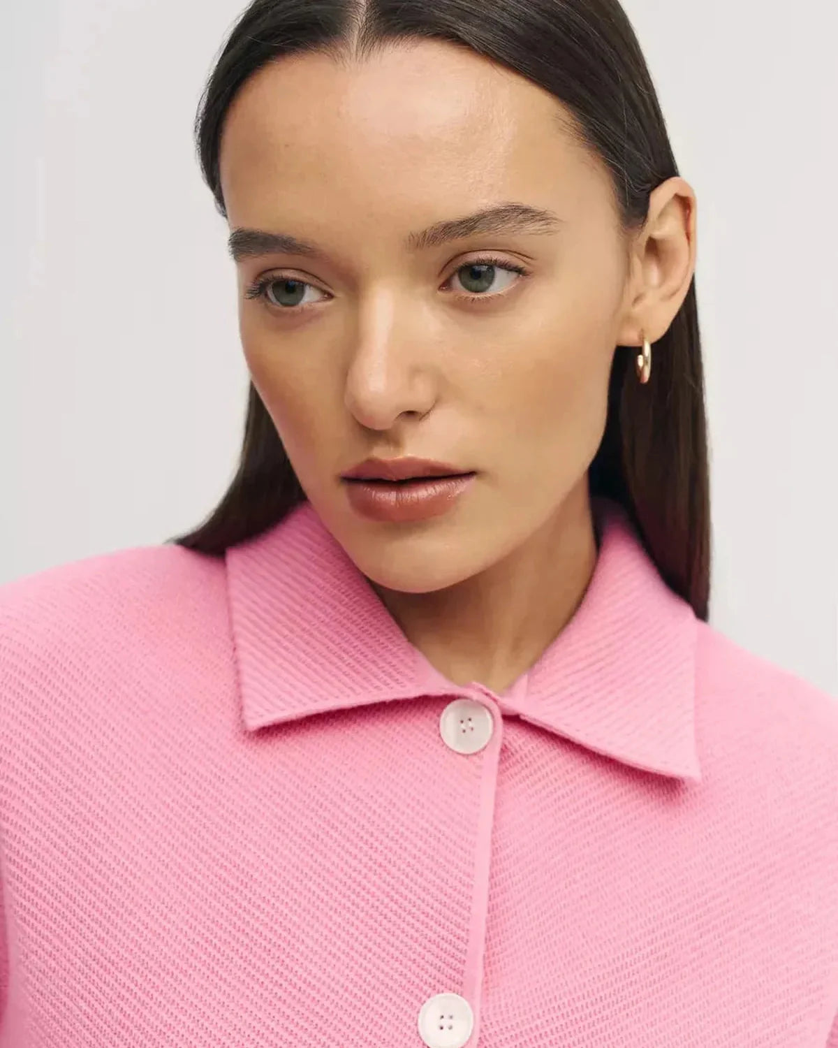 Serena Jacket by Slimona featuring a cropped pink design and button closure, perfect for a stylish women's wardrobe.