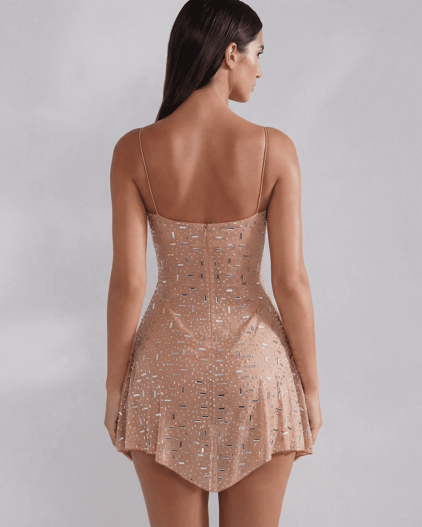 Back view of Slimona Monaco Mini Dress highlighting embellished details and structured fit with square neckline.