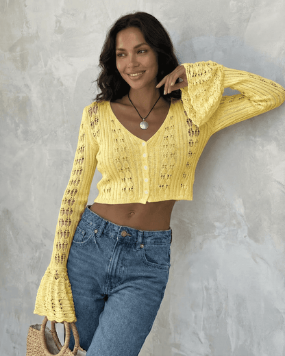 Solana Cardigan by Slimona in bright yellow, cropped cotton knit, featuring flare sleeves and a V-neckline.