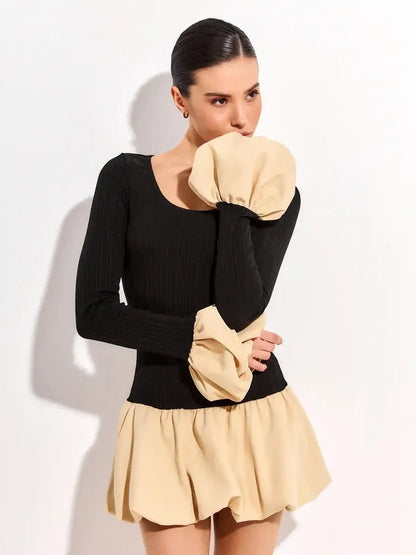 Black and beige two-tone Split Statement mini dress with ribbed long sleeves and voluminous skirt.