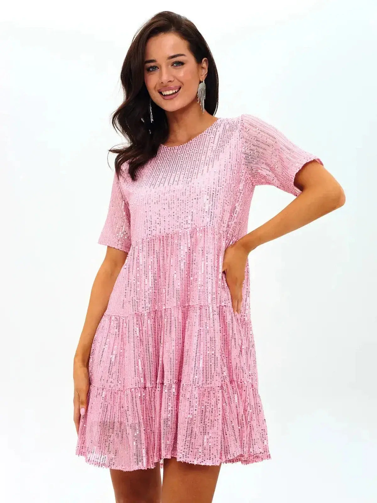 Sparkly pink tiered mini dress with sequins, perfect for summer parties and special occasions.