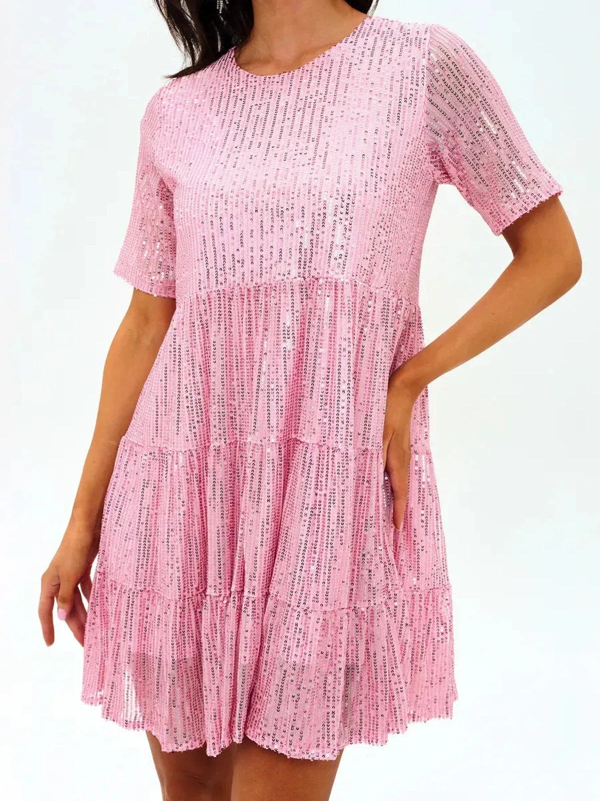 Sparkly pink mini dress with sequins, perfect for parties, weddings, and special occasions.