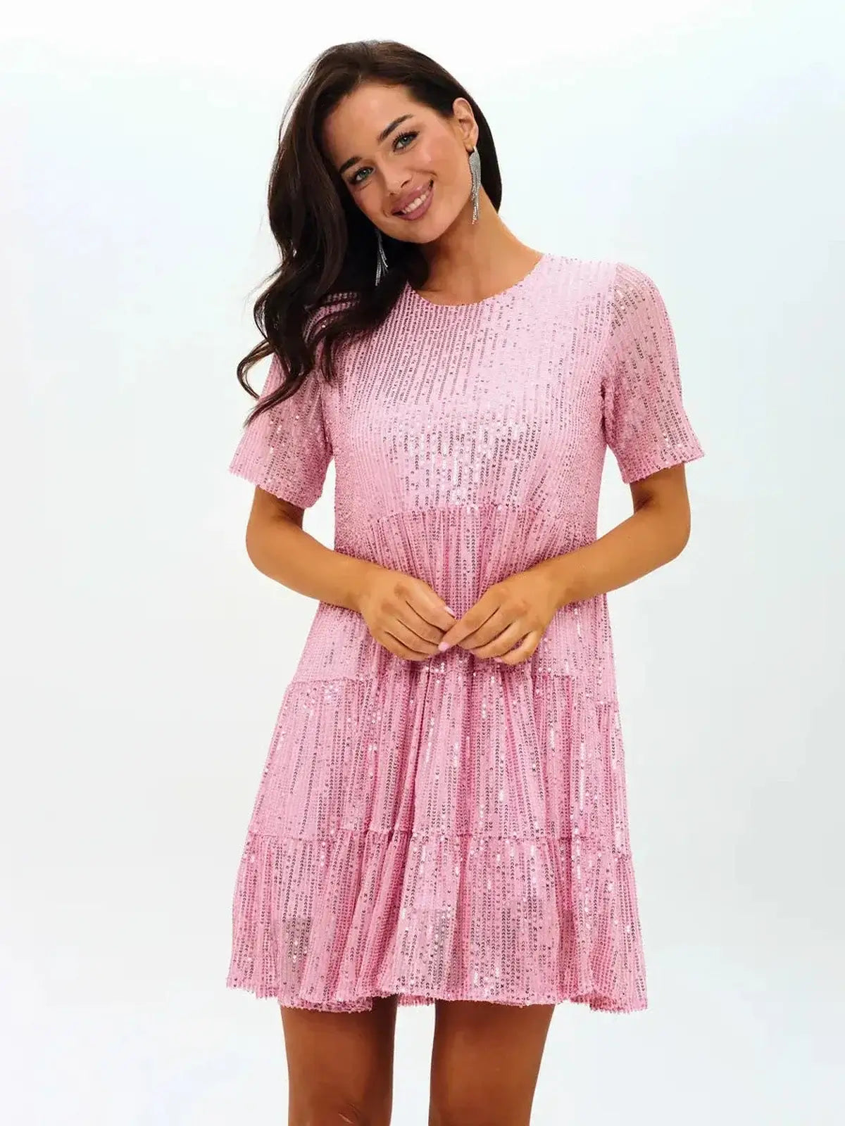 Sparkly pink mini dress with sequins, ideal for parties, weddings, and summer celebrations. Flirty A-line silhouette.