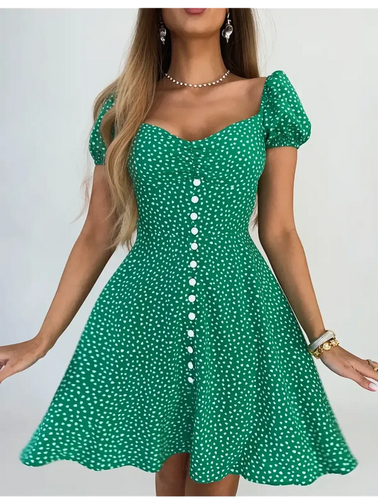 Green sweetheart charm mini dress with puff sleeves and button detail, perfect for summer parties and casual outings.