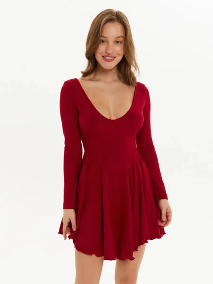 Red mini dress with long sleeves and a deep U-shaped neckline, perfect for party styles and wedding guest occasions.