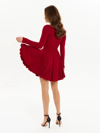 Red Velvet Flame mini dress with flared skirt and long sleeves, perfect for party or wedding guest wear.