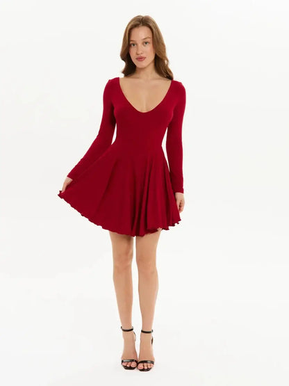 Red Velvet Flame mini dress with long sleeves and flared ruffle skirt, perfect for party or wedding guest wear.