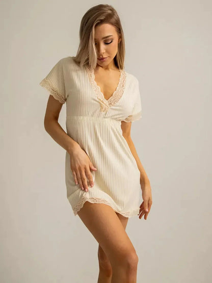 Light beige mini dress with lace trim and short sleeves, perfect for summer parties and casual outings.