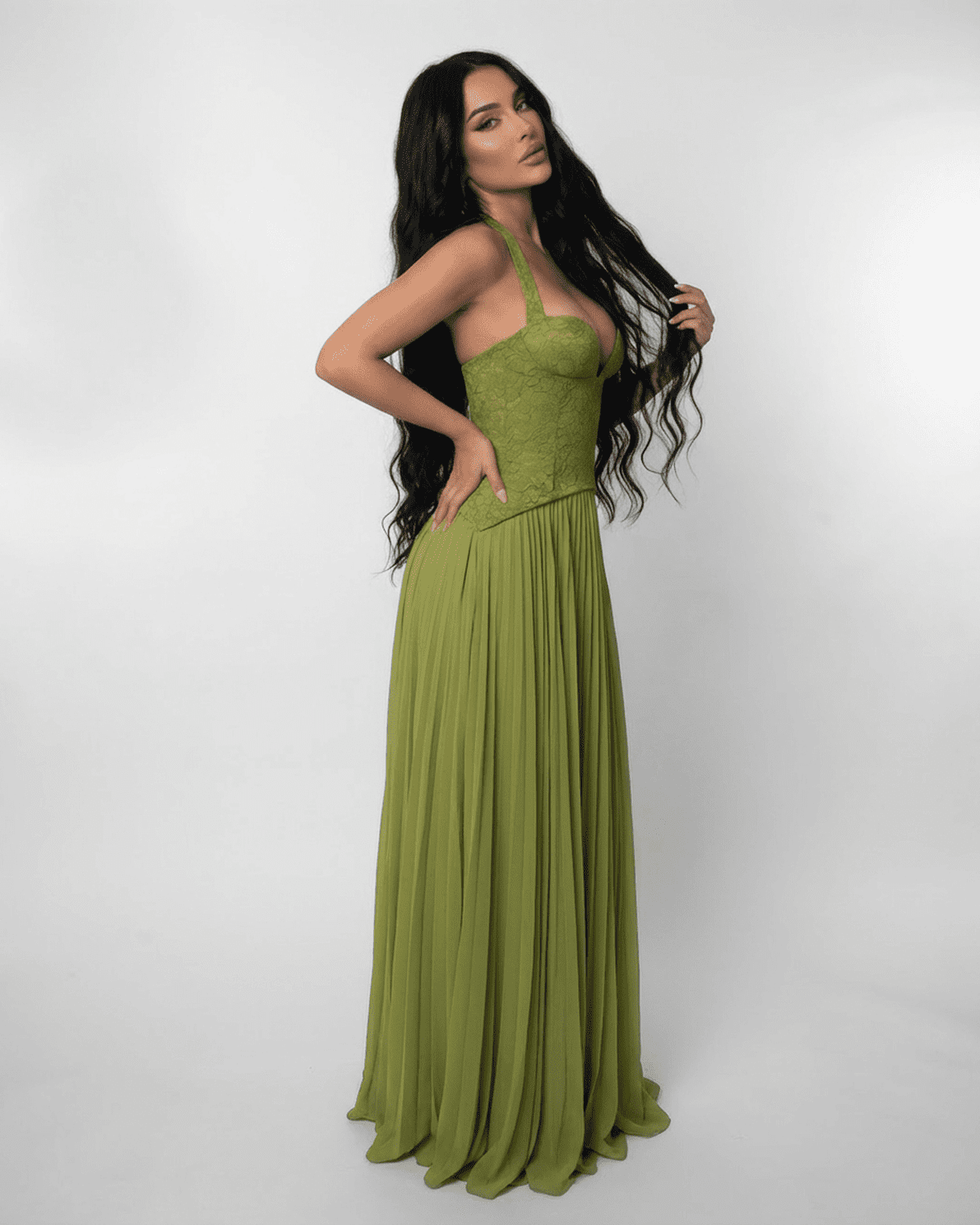 Slimona Verdant Maxi Dress featuring a lace bodice and pleated skirt in rich olive green.
