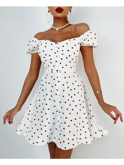 Charming white mini dress with polka dots, off-shoulder design, and button detailing, perfect for summer parties.